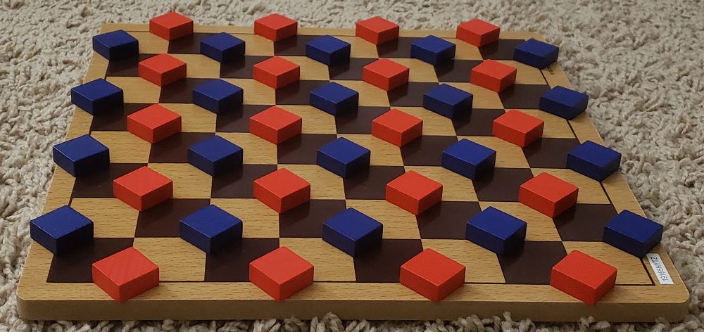 Setup of the board with two sparse interleaved grids of pieces.